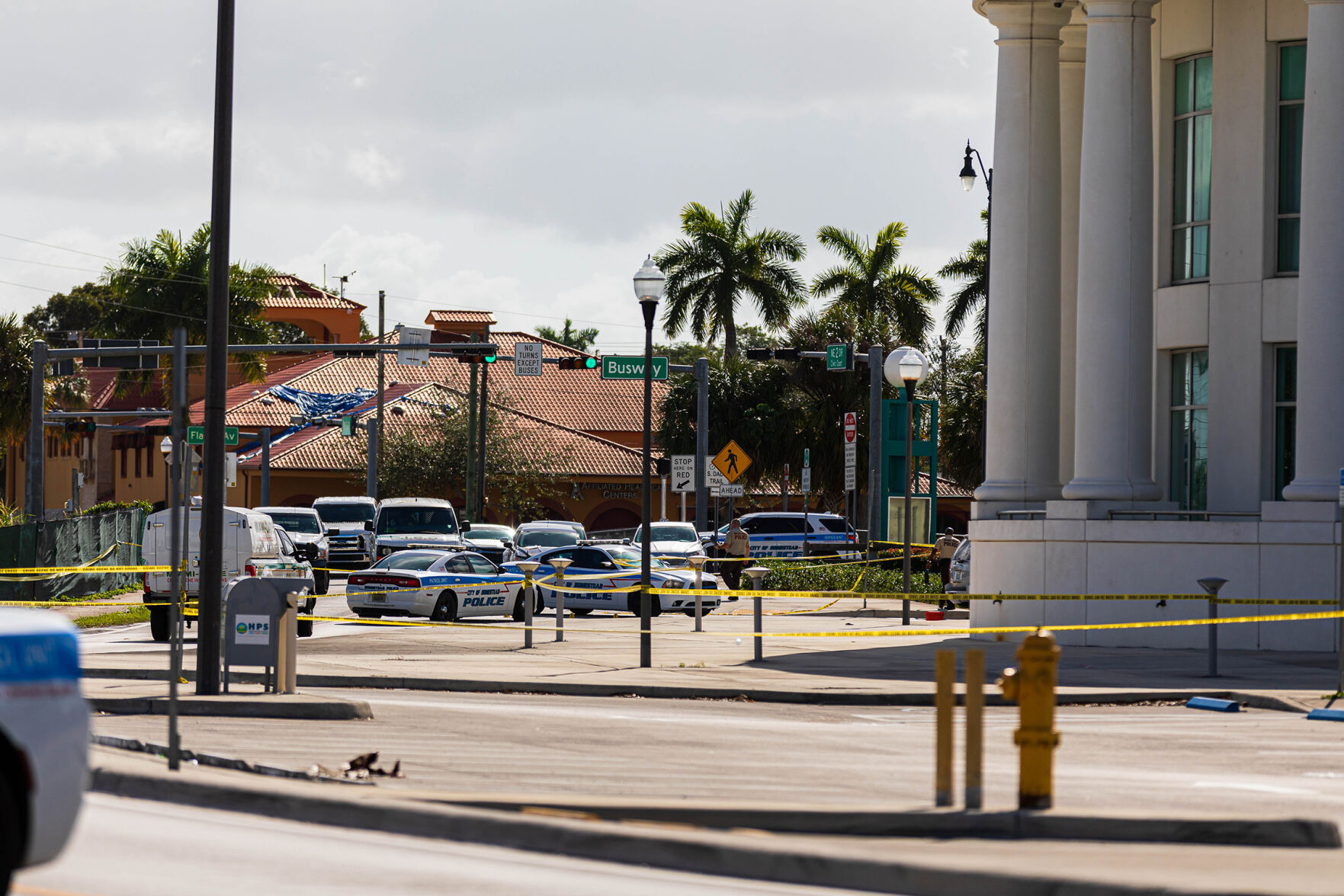Late Sunday Morning Miami-Dade PD personnel continued to work the crime scene around Homestead City Hall.